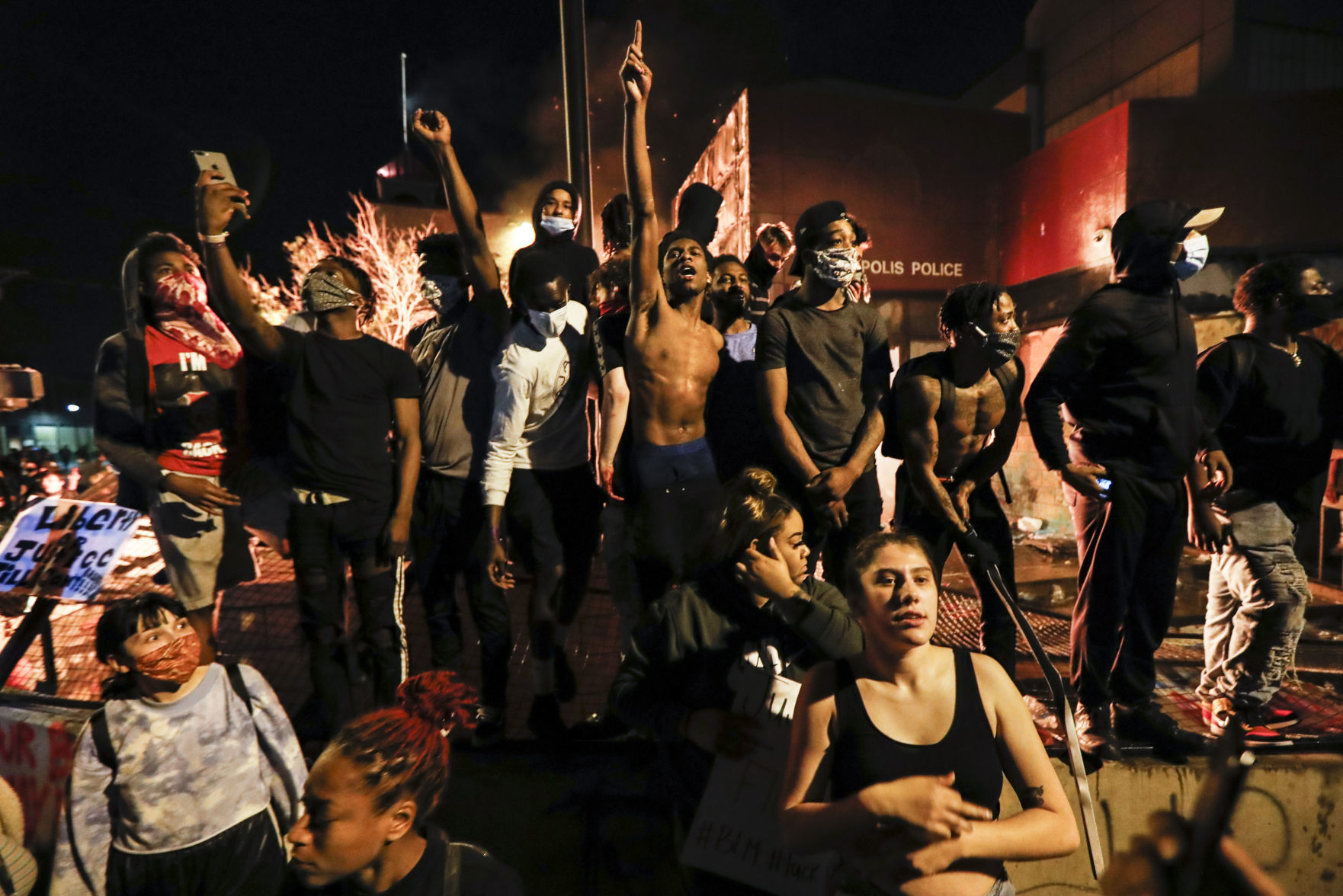 George Floyd protesters set Minneapolis police station afire